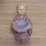 Bouddha bébé rose bougie dans fleur de lotus, hauteur 11 cm - Boutique ésotérique La Porte des Secrets