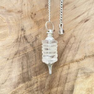 Pendule Donut de avec sept disques cristal de roche - Boutique La Porte des Secrets