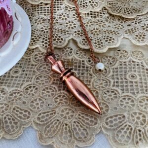 Pendule du Nil égyptien en cuivre massif  poli.- Boutique La Porte des Secrets