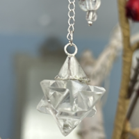 Pendule Merkaba en cristal de roche et métal argenté 3 x3 cm boutique La Porte des Secrets