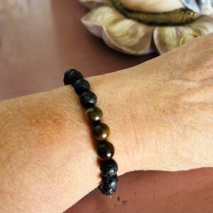 Bracelet ajustable Pierre de lave noire et 3 oeil de tigre artisanal fait main. Boutique La Porte des Secrets