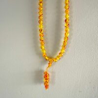 Mala artisanal fait main en perles d'ambre 8mm. Boutique La Porte des Secrets