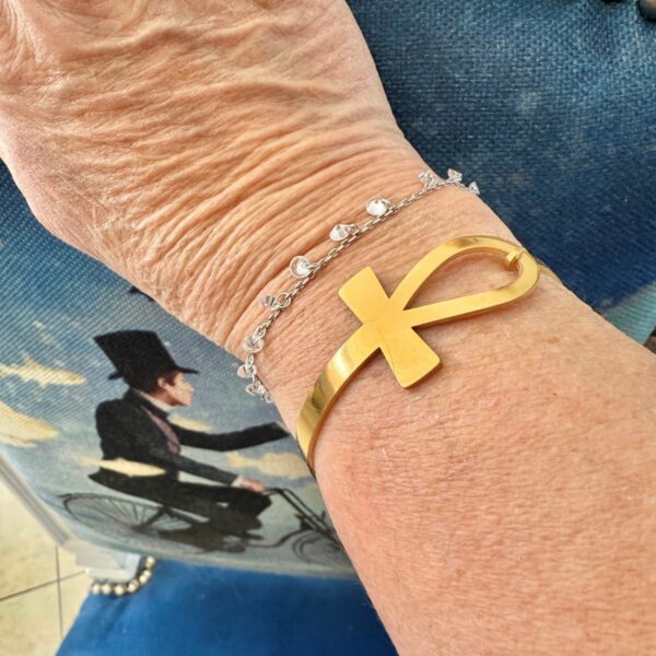 Bracelet croix de vie en métal doré inoxydable azjustable poignet 16-19cm environ; Très féminin, agréable et facile à porter. Tour de poignet de 15 à 20 cm. Boutique ésotérique La Porte des Secrets